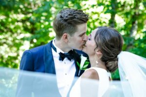 Alycia Sanders, portapixie events photographer bride groom kiss